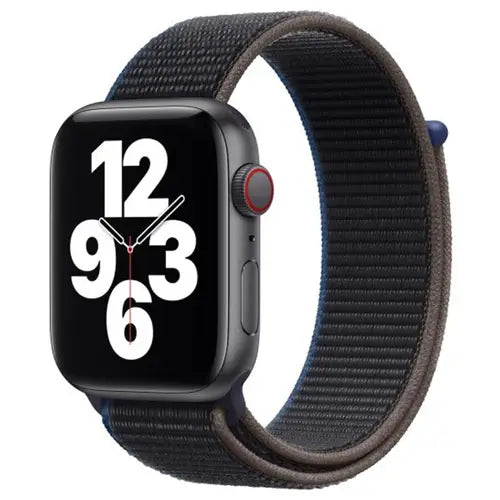 This image features the Apple Watch SE in a 44mm size, showcased with a sleek silver case and a matching silver band. The watch face displays a bold, analog dial with a simple design, enhancing its stylish yet functional appeal.