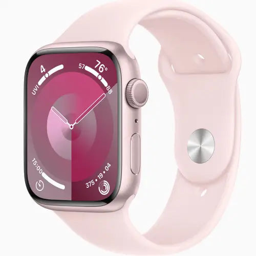 This image features the Apple Watch Series 9 in a 45mm size, showcased with a sleek pink band and a matching pink case. The watch face displays a vibrant, detailed interface with various app icons and a prominent digital crown on the side.