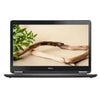 Dell Latitude E7250 laptop with a black color scheme, displaying a screen with a visible wallpaper, positioned in front of a neutral background with a decorative plant to the left.