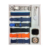 Fendior S100 Ultra A collection of smart watch accessories including bands, watch faces, and a charging cable neatly arranged in a box.