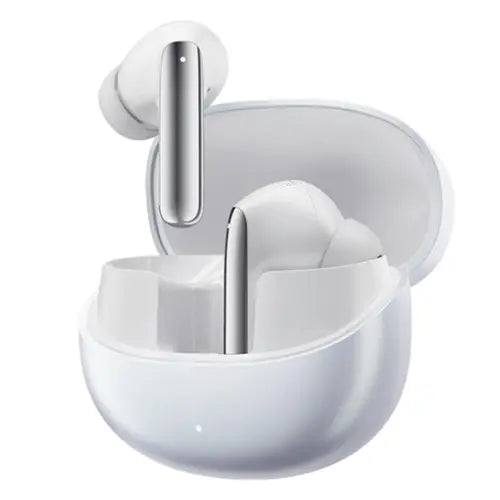 A pair of white QCY MeloBuds Pro earphones placed inside an open charging case.