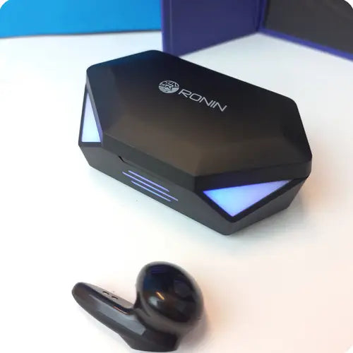 Black electronic device with blue LED lights on a white surface of Ronin Gaming Battle Pods (R-490)