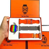 S9 ultra smart watch in a box pack and 3 orange and gray straps in it