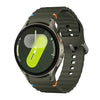 Samsung Galaxy Watch 7 44mm with a green silicone band and a black case, displaying a green watch face with a yellow accent.