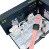 X6 Pro Smartwatch and earbuds in a box with accessories.