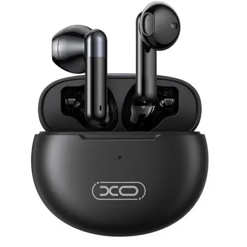 A pair of black XO X13 Magic Ring TWS Bluetooth earbuds on a surface with a charging case in the background.