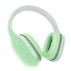 Xiaomi MI Headphones Comfort in Mint green colour with white accents on a white background
