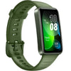 A green Huawei Band 8 fitness tracker with a silicone band and a digital display showing the time, step count, and calories burned.
