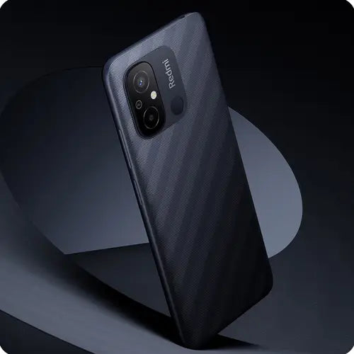 A black Redmi 12C mobile phone shown from the back with a camera module visible.