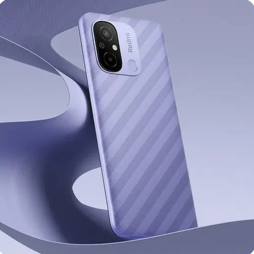 A black Redmi 12C mobile phone shown from the back with a camera module visible.