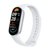 Xiaomi Smart Band 9 with a silver strap and a digital display showing time, heart rate, step count, and battery level.